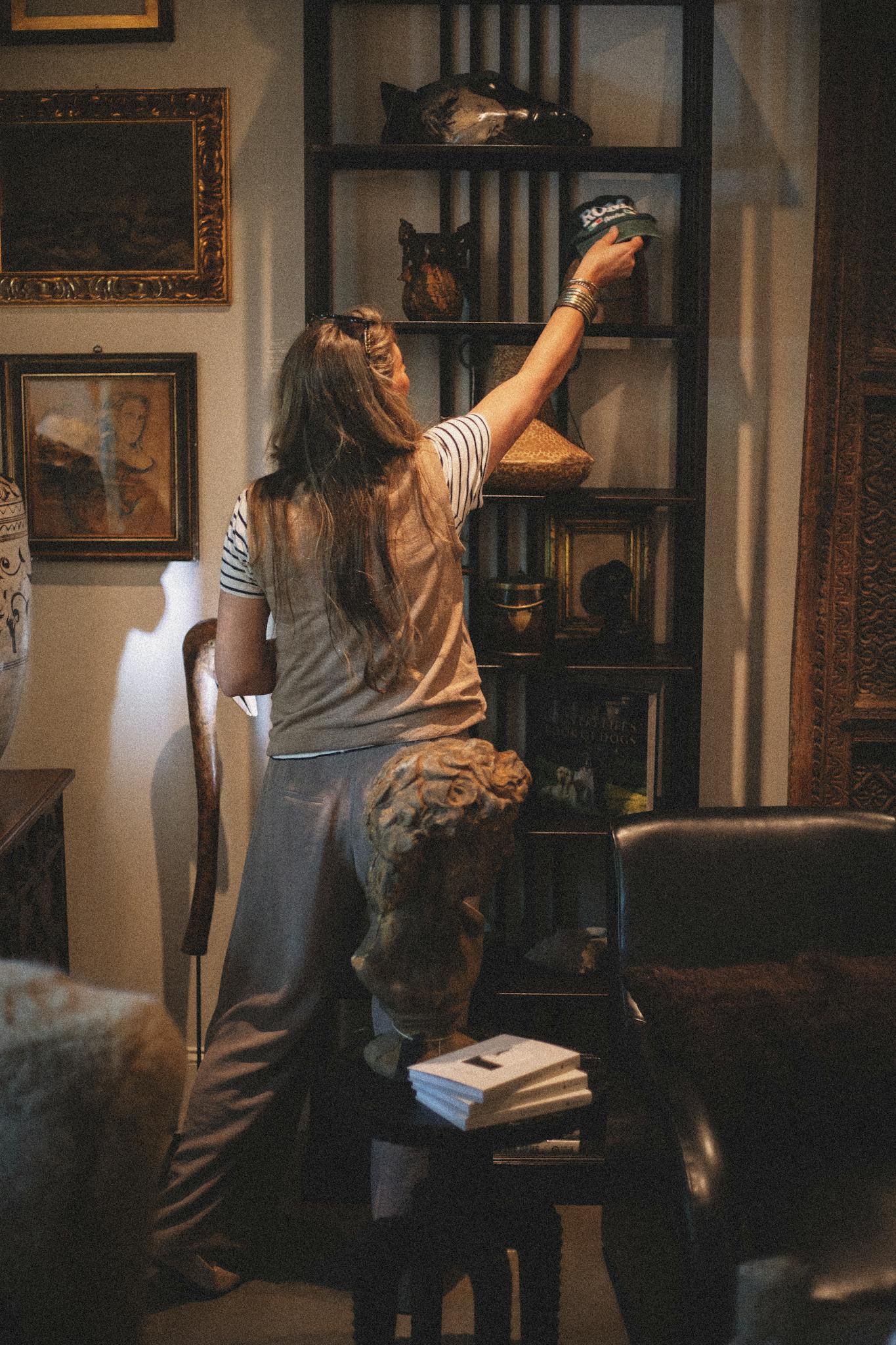 A warmly lit vintage boutique showcasing curated artisan goods and decor in Greenville, SC.